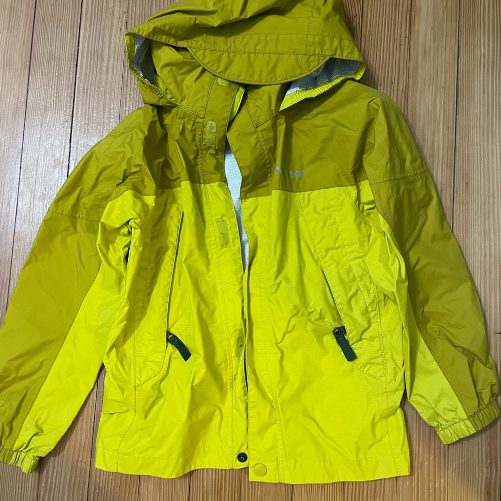 Kids Marmot rain jacket, mustard yellow two tone. Size 8